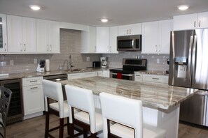 Microwave, dishwasher, coffee/tea maker, ice maker