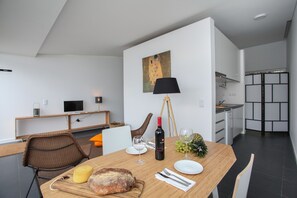 Family Suite, 1 Bedroom, Garden View, Ground Floor (Rosa) | Living area | Flat-screen TV - Place of Moments Urban (Ponta Delgada)