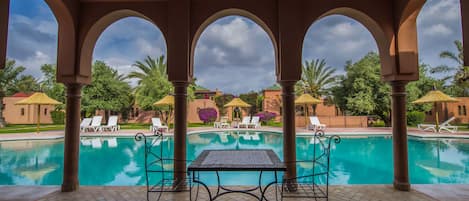 Outdoor pool, open 8 AM to 8 PM, pool umbrellas, sun loungers