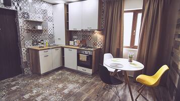 Comfort Apartment, 1 Bedroom | Private kitchen | Fridge, oven, stovetop, espresso maker