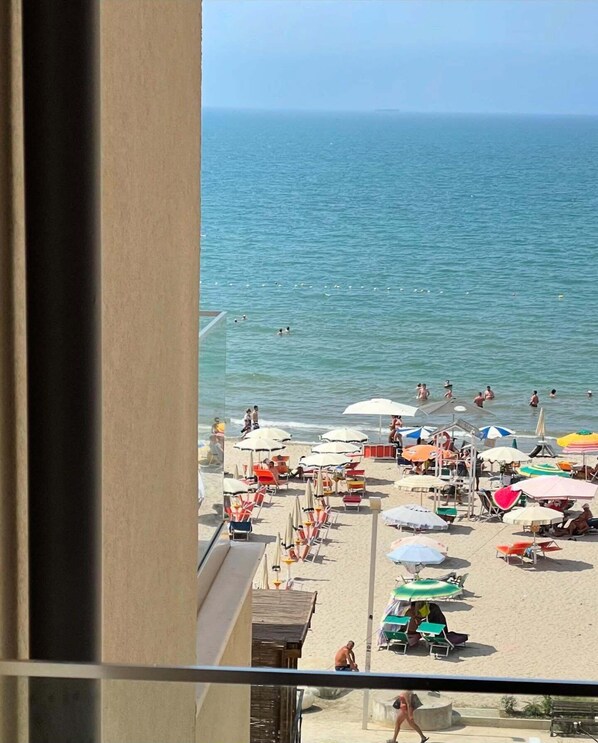 Classic Triple Room, Partial Sea View | Minibar, desk, free cribs/infant beds, free WiFi