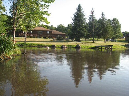 Quiet Country Log Home on three ponds.  All we overlook is the scenery..