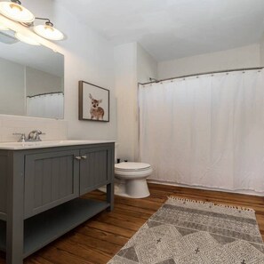 Bathtub, hair dryer, towels