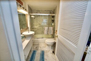 Hair dryer, towels, soap, toilet paper