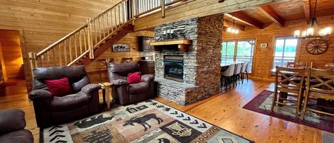 Smart TV, fireplace, table football, books