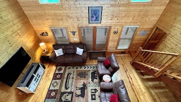 Smart TV, fireplace, table football, books