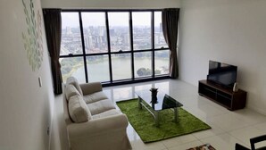 Apartemen, 1 kamar tidur | Ruang keluarga | TV LCD