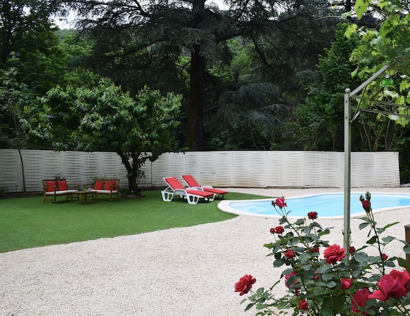 Seasonal outdoor pool, pool umbrellas, pool loungers