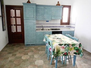 Apartment, 2 Bedrooms | Private kitchen | Full-size fridge, stovetop, cookware/dishes/utensils - La Maddalena 2 - Tra Centro e Caprera (La Maddalena)