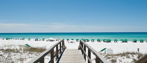 On the beach, sun-loungers