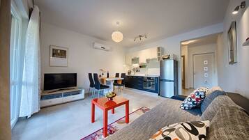 Apartment, Sea View (AP 2) | Living area | Flat-screen TV