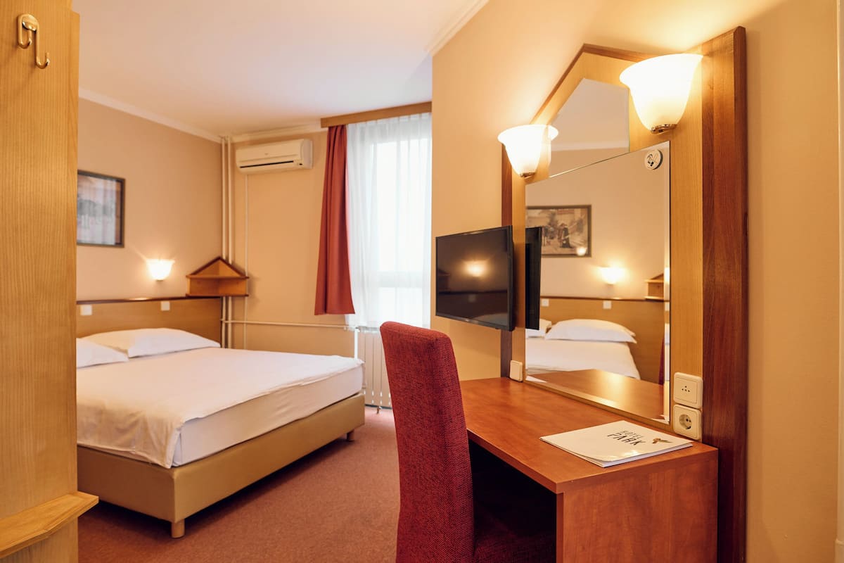 Classic Double Room with Extra Bed | Desk, blackout drapes, free WiFi, bed sheets