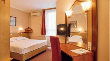 Classic Double Room with Extra Bed | Desk, blackout drapes, free WiFi, bed sheets