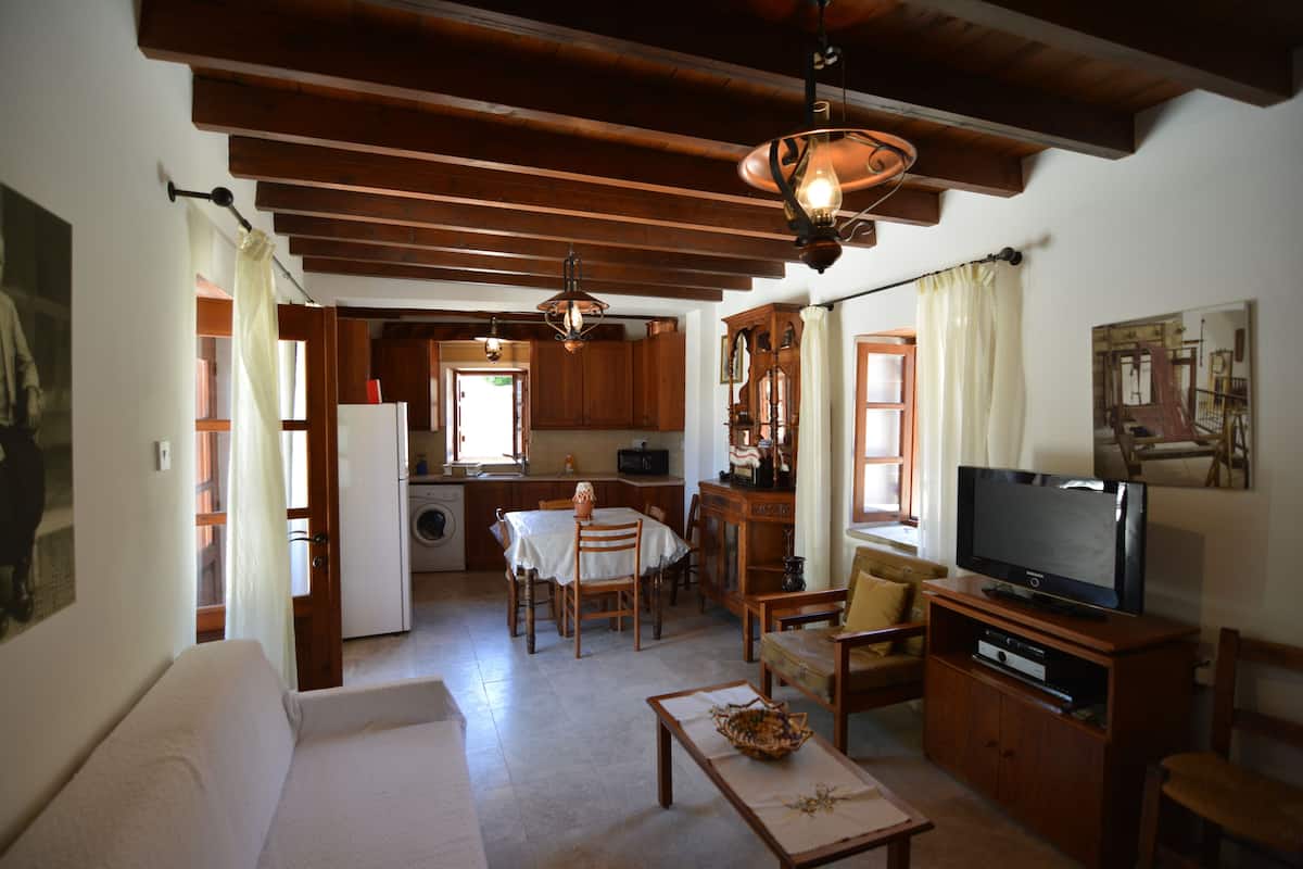 Luxury Apartment | Living area | Flat-screen TV, fireplace