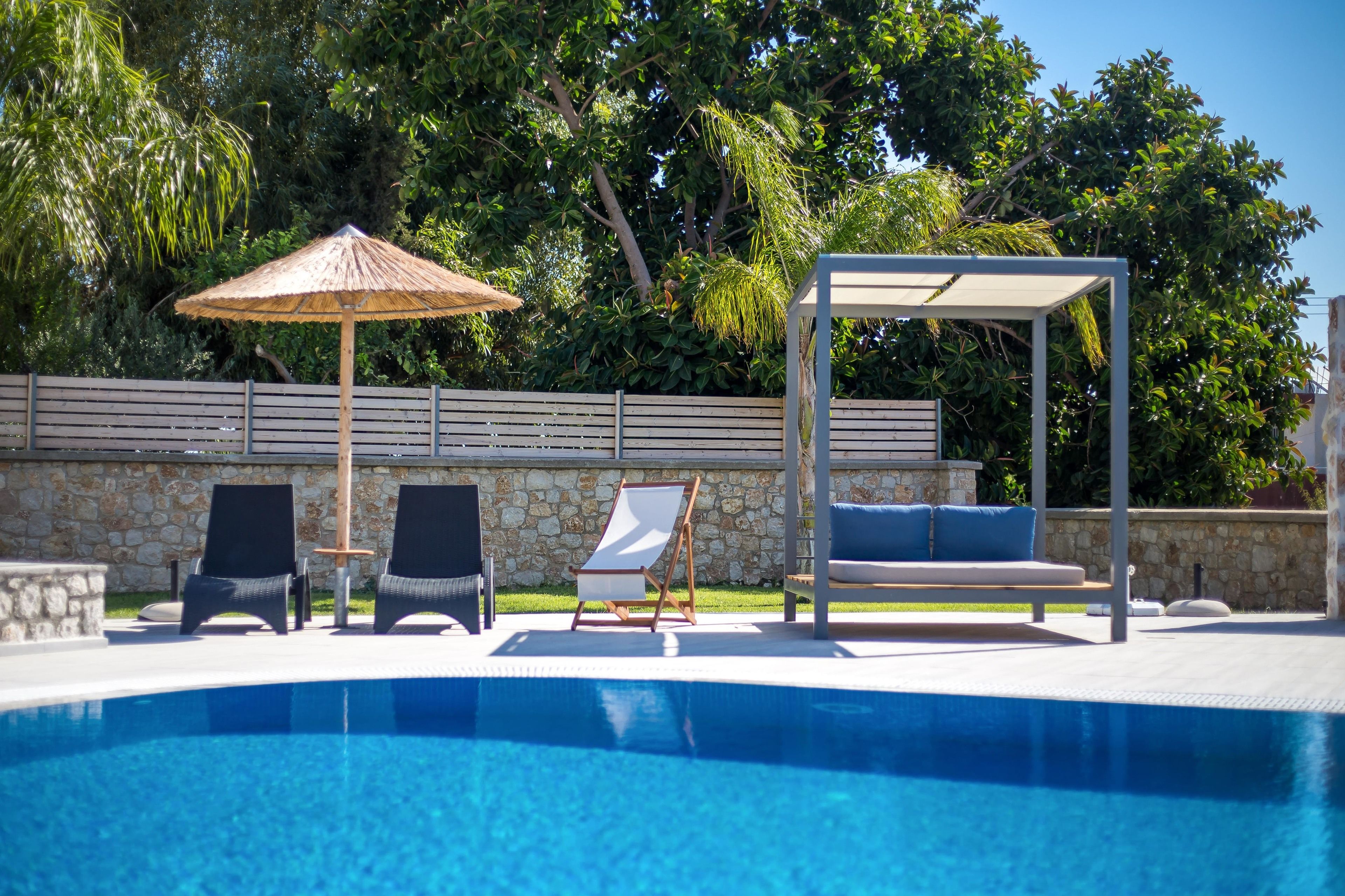 seasonal outdoor pool, pool umbrellas, pool loungers