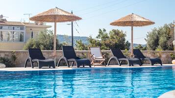 Seasonal outdoor pool, pool umbrellas, sun loungers