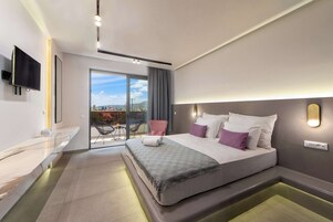 Premium Double Room, Partial Sea View | In-room safe, desk, blackout drapes, soundproofing