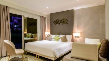 Deluxe Garden Room | Minibar, in-room safe, cribs/infant beds, free WiFi