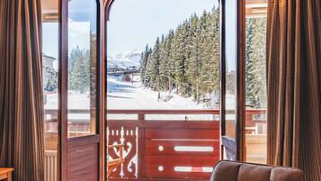 Junior suite | Woonruimte | Flatscreentelevisie