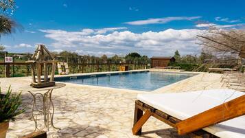 Seasonal outdoor pool, pool umbrellas, sun loungers