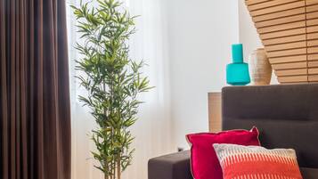 Apartment, 1 Bedroom | Living room | Flat-screen TV