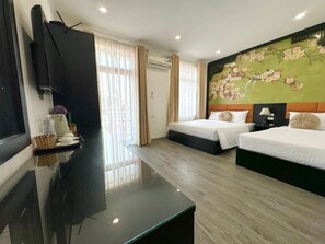 A hotel room with two beds, a TV, and a large window with curtains. - Hanoi Elpis Hotel (Hanoi)