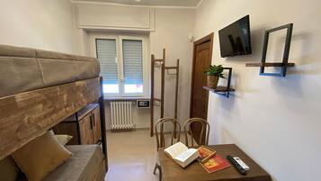 City Quadruple Room, Private Bathroom (City) | 1 bedroom, premium bedding, minibar, in-room safe