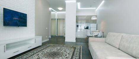 Business Apartment, 1 Bedroom, Balcony | Living area | Flat-screen TV