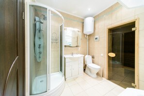 Shower, hair dryer, towels, soap
