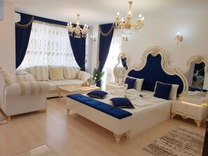 Exclusieve studio suite, 1 slaapkamer | 1 slaapkamer, een kluis op de kamer, een strijkplank/strijkijzer