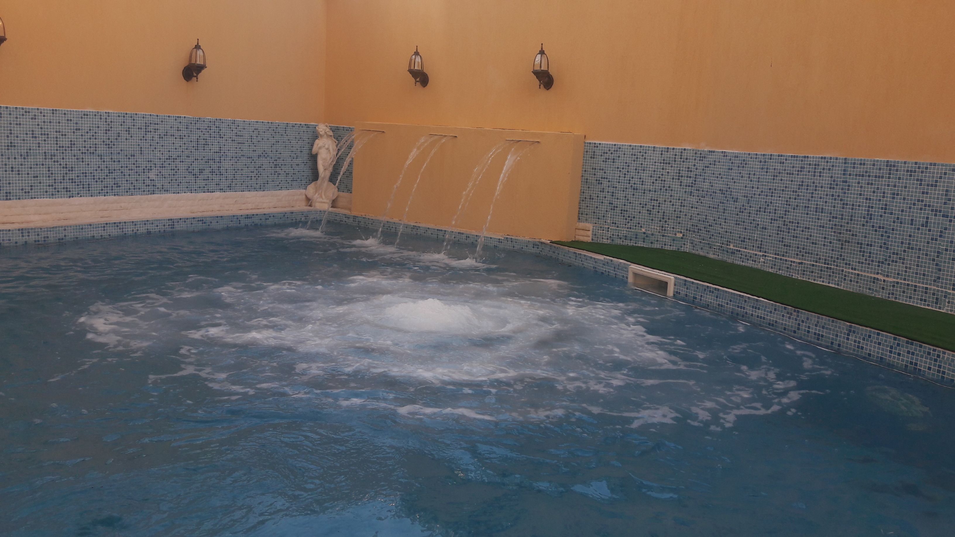 indoor pool, outdoor pool, pool umbrellas, pool loungers