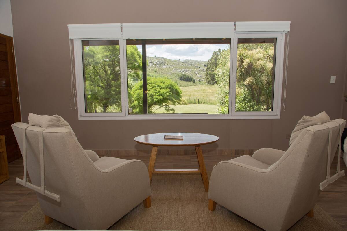 superior bungalow, garden area | living area | flat-screen tv, fireplace