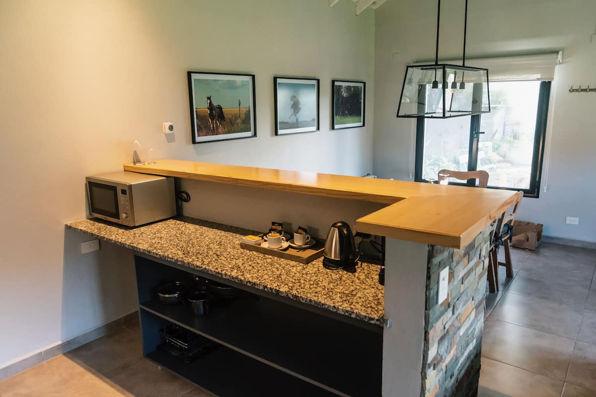 family suite, 1 bedroom, kitchen, garden view | in-room safe, individually furnished, free wifi