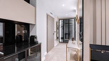 Signature Suite, 1 Queen Bed, Jetted Tub, Pool View | Living area | Flat-screen TV