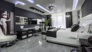 Suíte júnior, 1 cama King | Roupas de cama premium, frigobar, cofres nos quartos