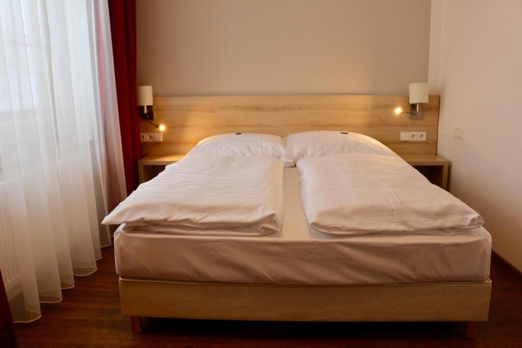 desk, blackout curtains, free wifi, bed sheets