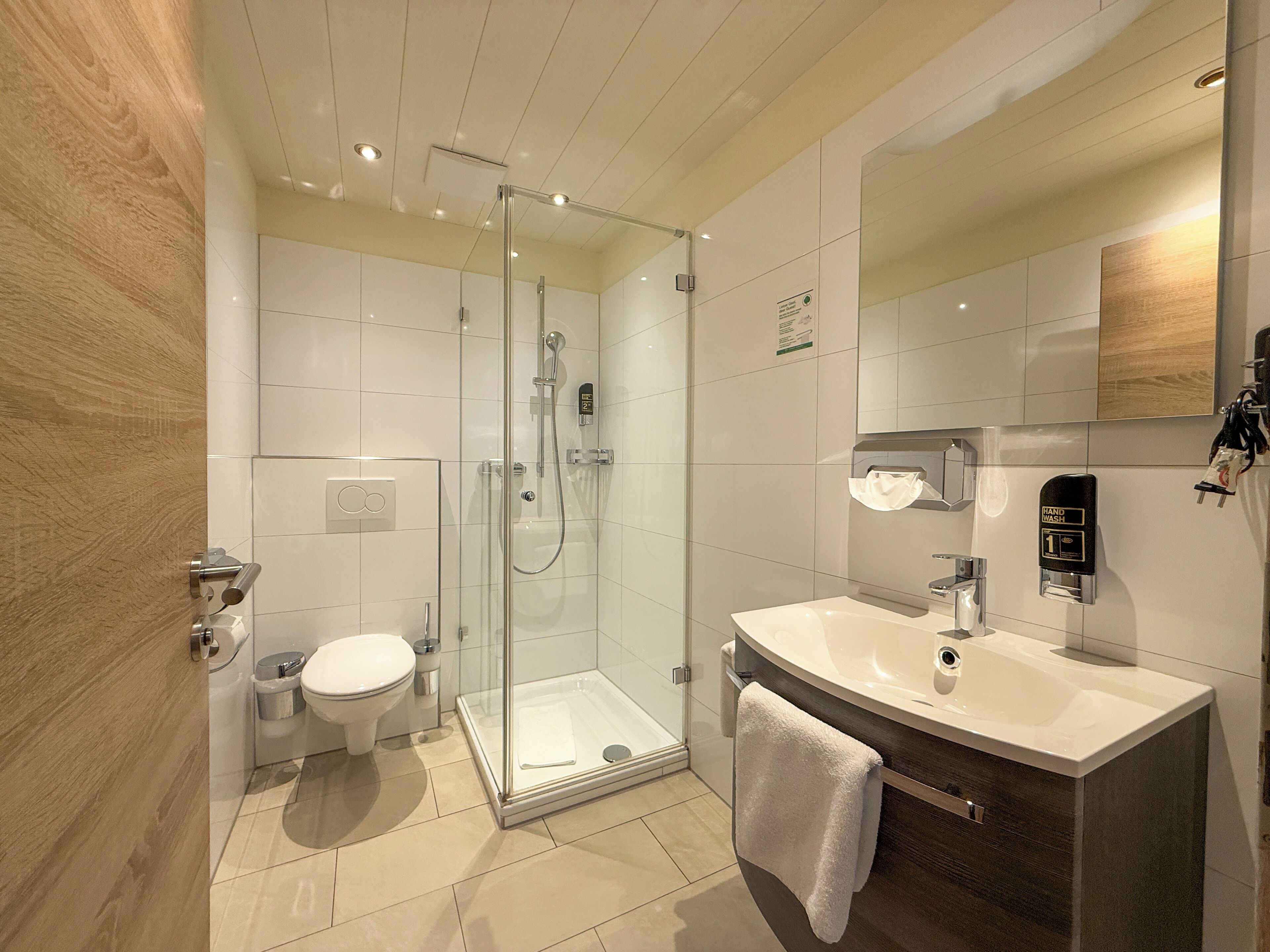 family room | bathroom | shower, free toiletries, hair dryer, towels