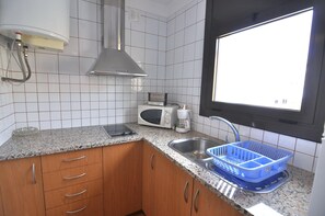 Fridge, microwave, coffee/tea maker, toaster