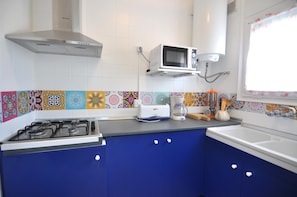 Fridge, microwave, coffee/tea maker, toaster