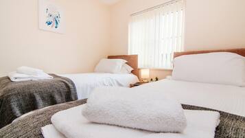 3 bedrooms, premium bedding, iron/ironing board, free WiFi
