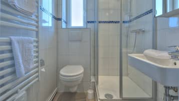 Shower, free toiletries, hair dryer, towels