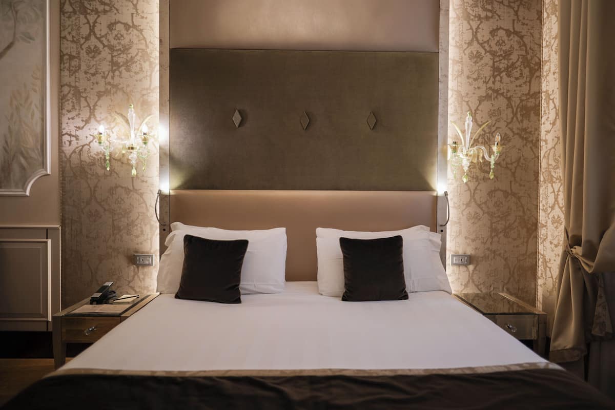 Frette Italian sheets, premium bedding, down duvets, pillow-top beds