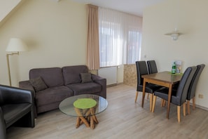Apartment, 2 Bedrooms | Living area | 25-inch flat-screen TV with satellite channels - Appartementhaus Alt Büsum (Büsum)
