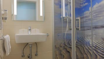 Ducha, artículos de tocador gratuitos, secador de pelo