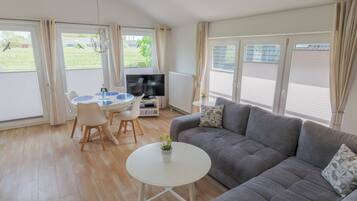 Apartment, 2 Bedrooms | Living area | Flat-screen TV