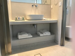 Junior Studio Suite, 1 Bedroom | Bathroom | Shower, rainfall showerhead, designer toiletries, hair dryer