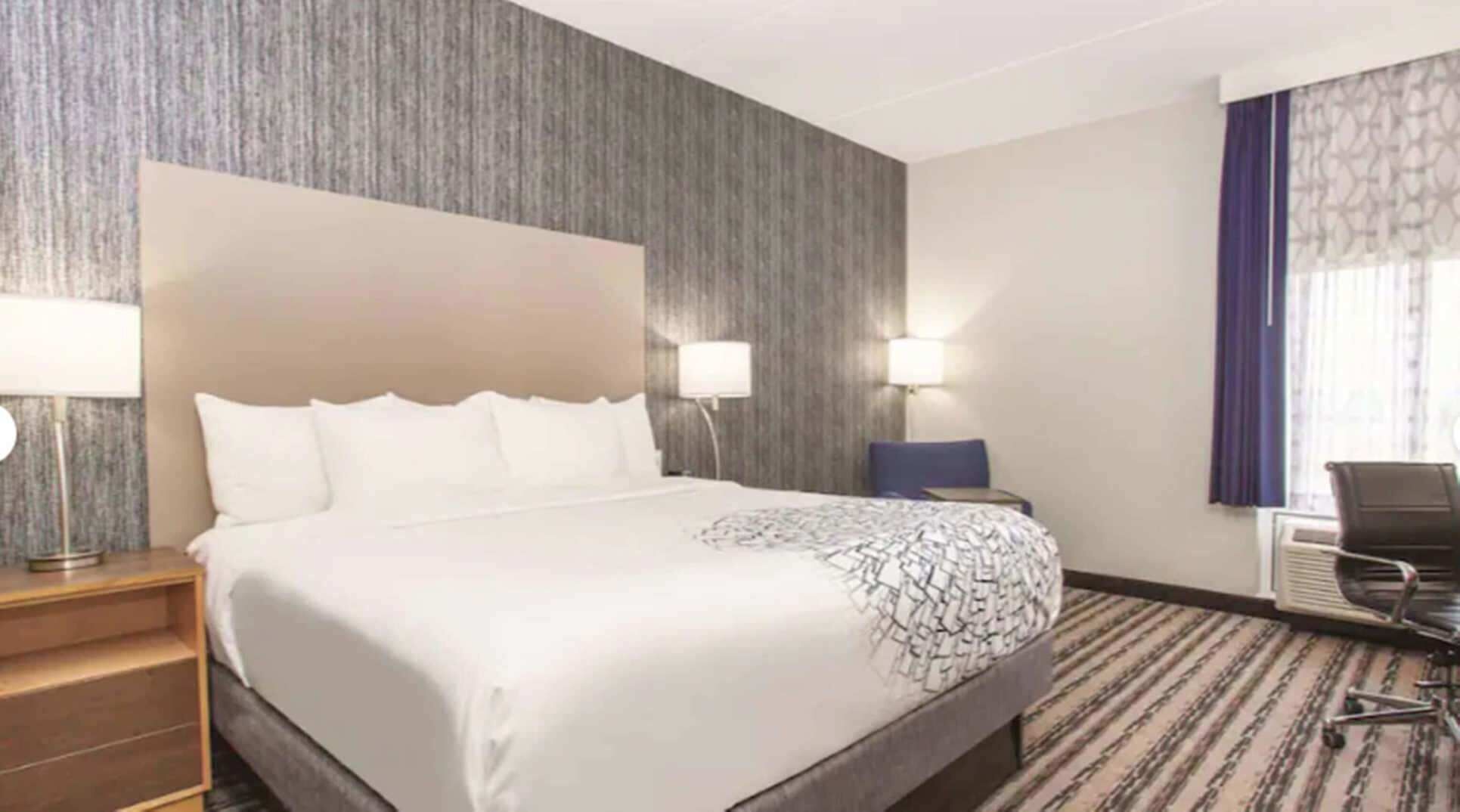 Premium bedding, pillowtop beds, desk, blackout drapes