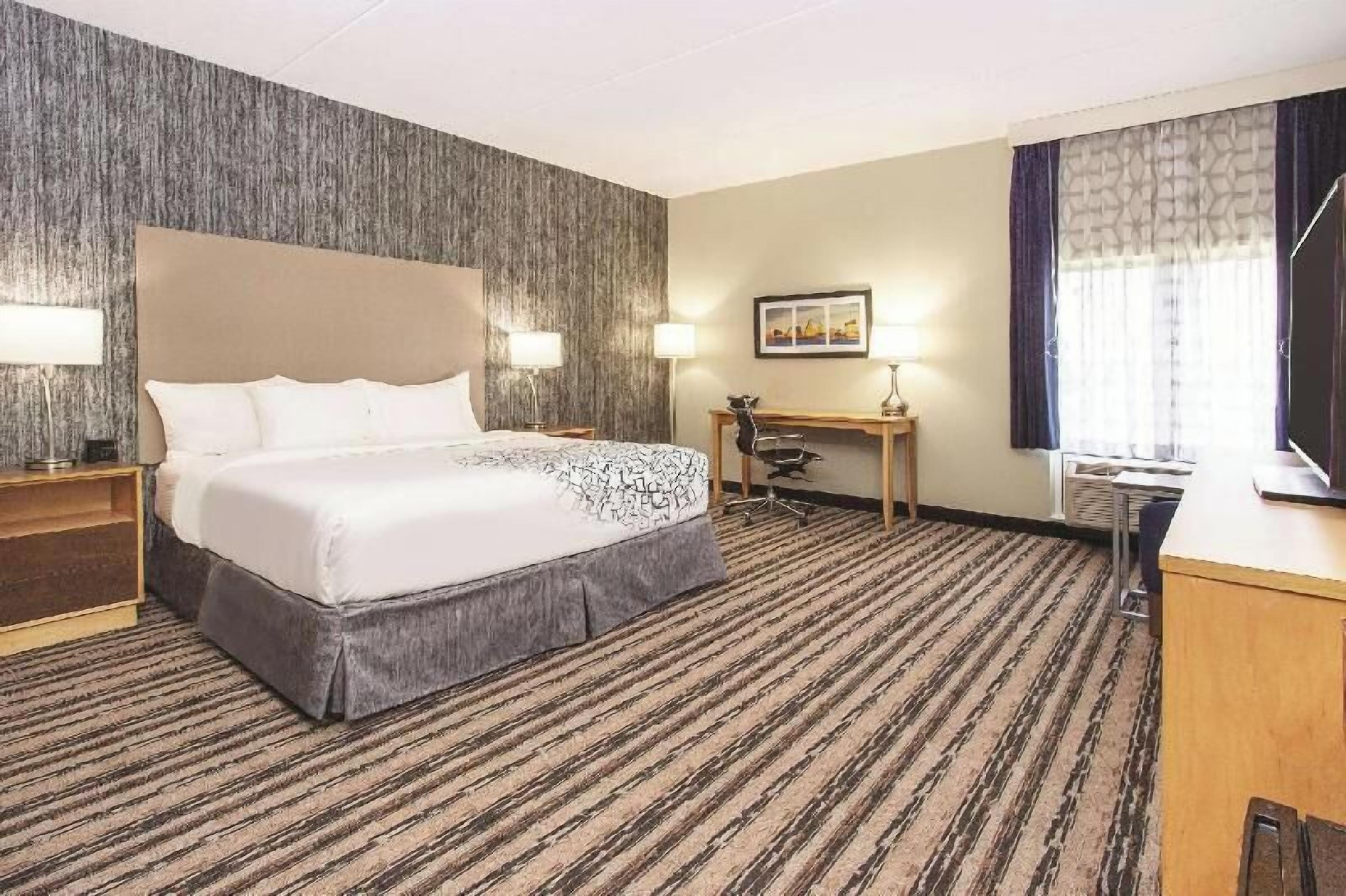Premium bedding, pillowtop beds, desk, blackout drapes