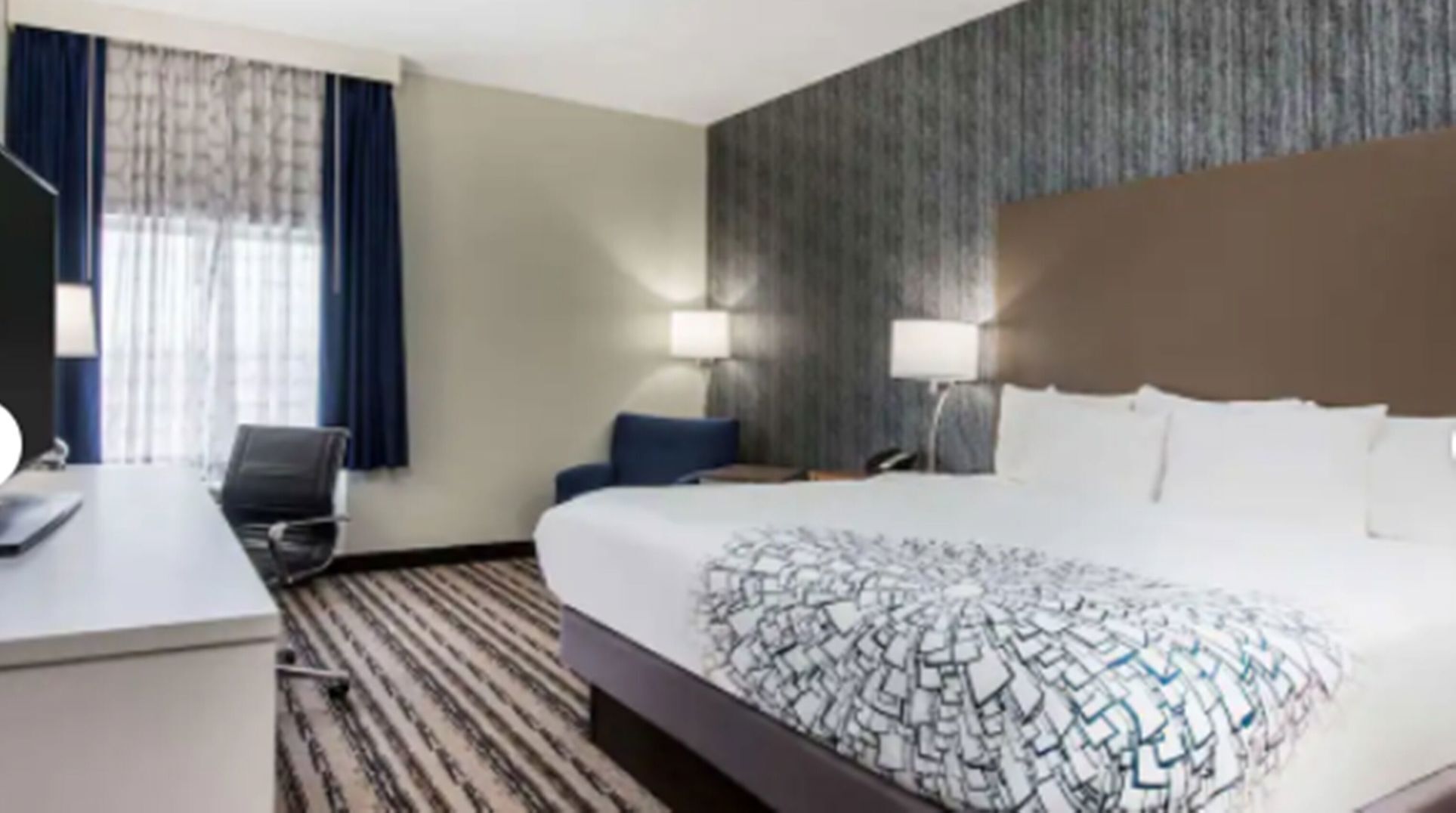 Premium bedding, pillowtop beds, desk, blackout drapes