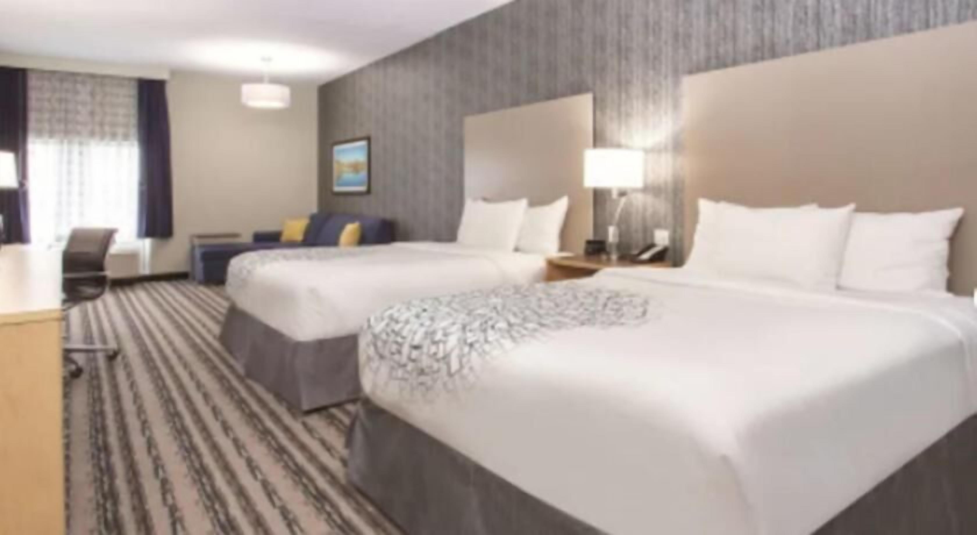 Premium bedding, pillowtop beds, desk, blackout drapes